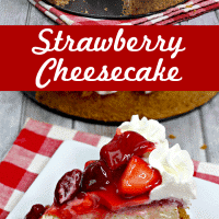 Strawberry cheesecake with whipped cream and strawberry sauce.