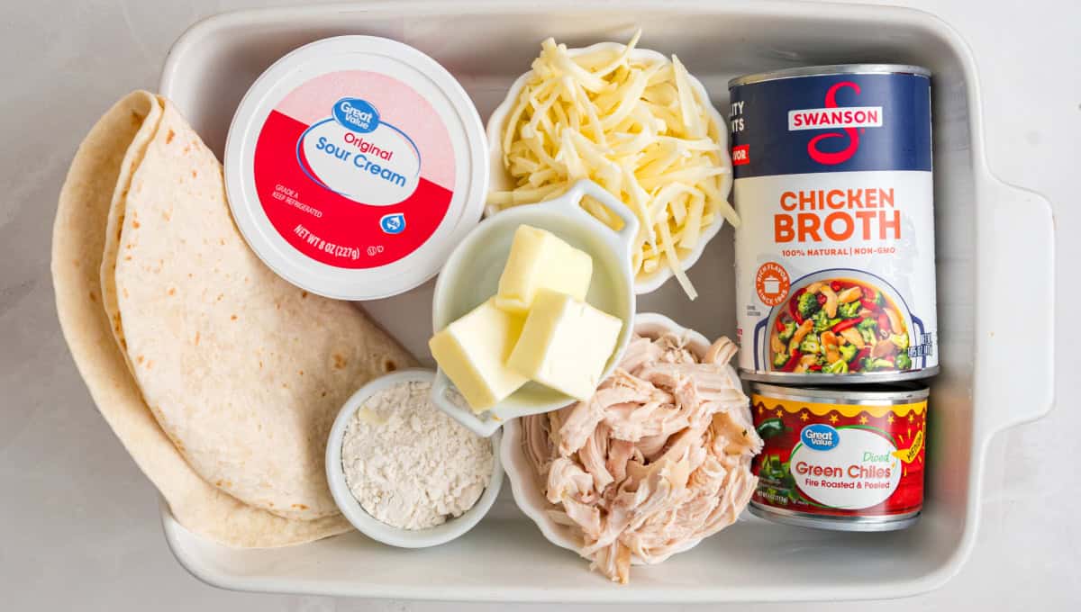 These White Chicken Enchiladas are made with rotisserie chicken, shredded cheese, and a simple sauce made with sour cream and green chiles. ingredients for white chicken enchiladas