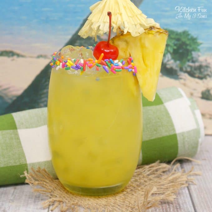 A Cake by the Ocean Cocktail is the perfect beach drink this summer. It's full of tropical flavors including pineapple and orange juice, coconut rum and yes, cake flavored vodka!