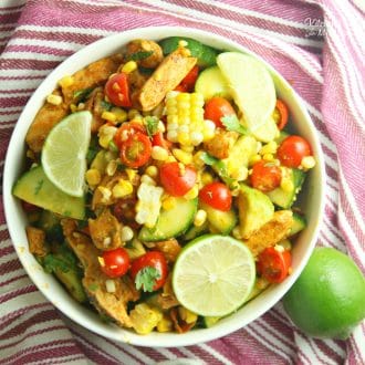 Cajun Lime Chicken Avocado Salad with corn and tangy cilantro lime dressing will knock your socks off. This is a a delicious summer salad.