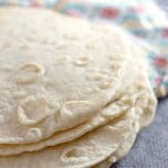 Homemade flour tortillas are so delicious! Once you eat freshly made flour tortillas made at home, you’ll never want to go back.