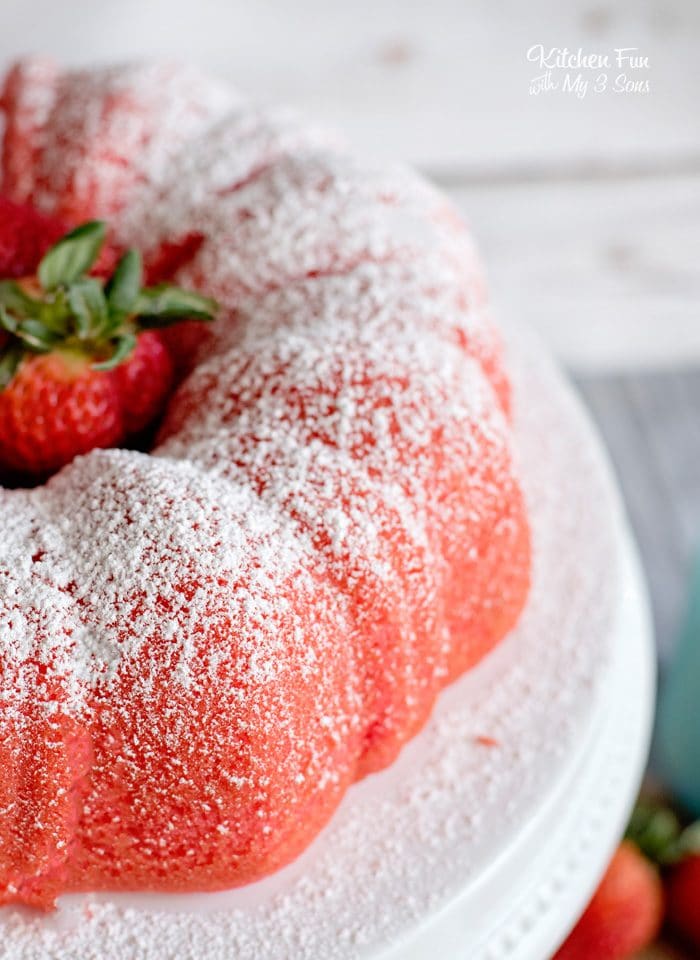 This Strawberry Bundt Cake is filled with a yummy vanilla, marshmallow filling! It's moist, creamy and full of delicious strawberry flavor.