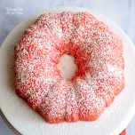 This Strawberry Bundt Cake is filled with a yummy vanilla, marshmallow filling! It's moist, creamy and full of delicious strawberry flavor.