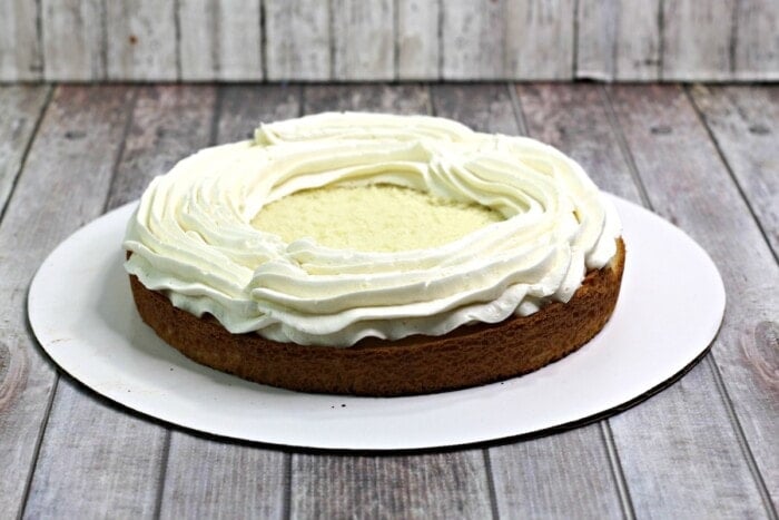 A round cake topped with frosting