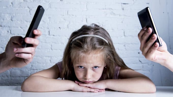 A Parent’s Use of Tech May Lead to Big Problems for Kids