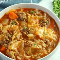 Cabbage Roll Soup with beef and chopped veggies is a delicious dinner recipe that will warm your belly on a cold and crisp fall day.