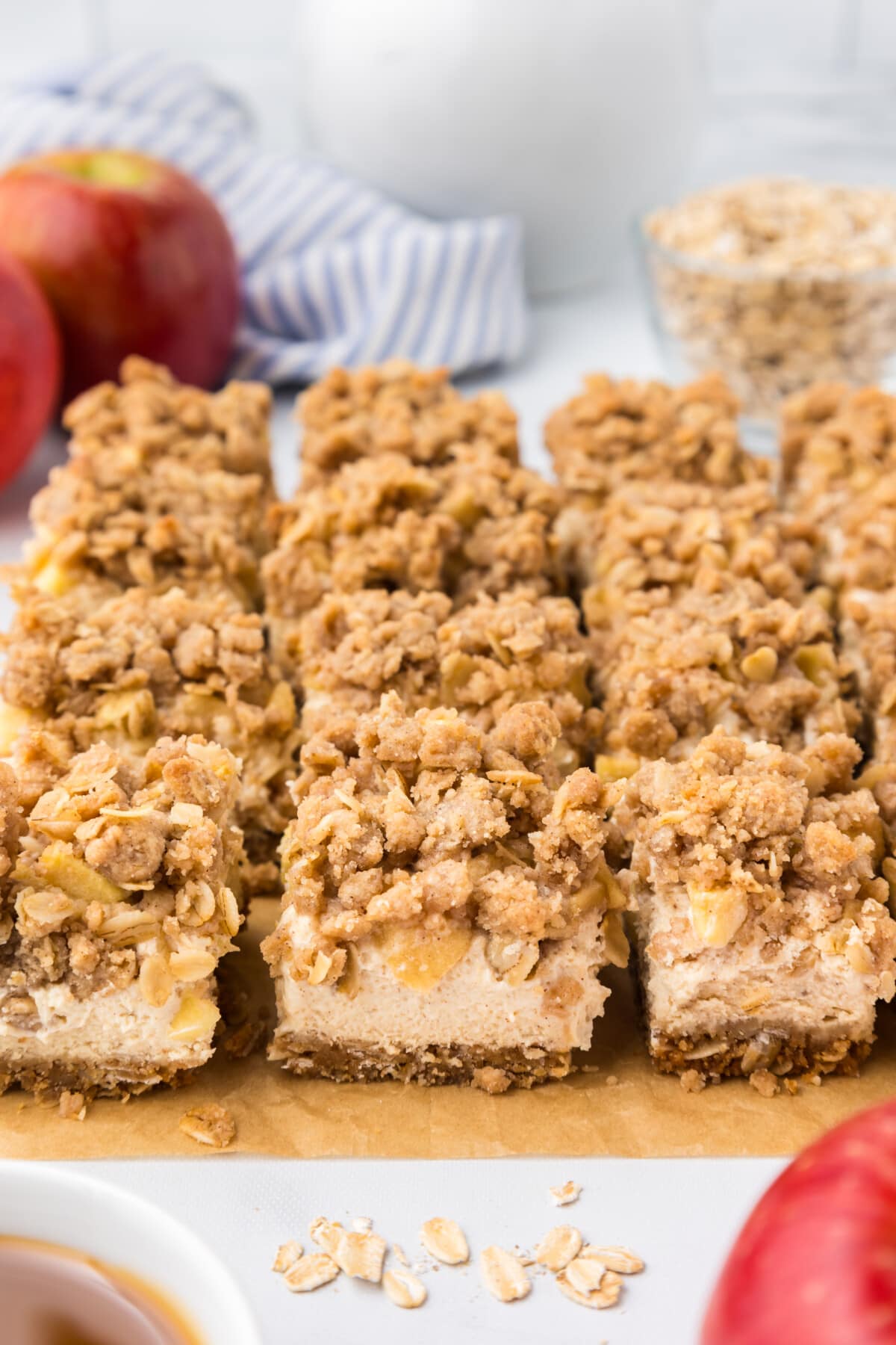 caramel apple cheesecake bars lined up together