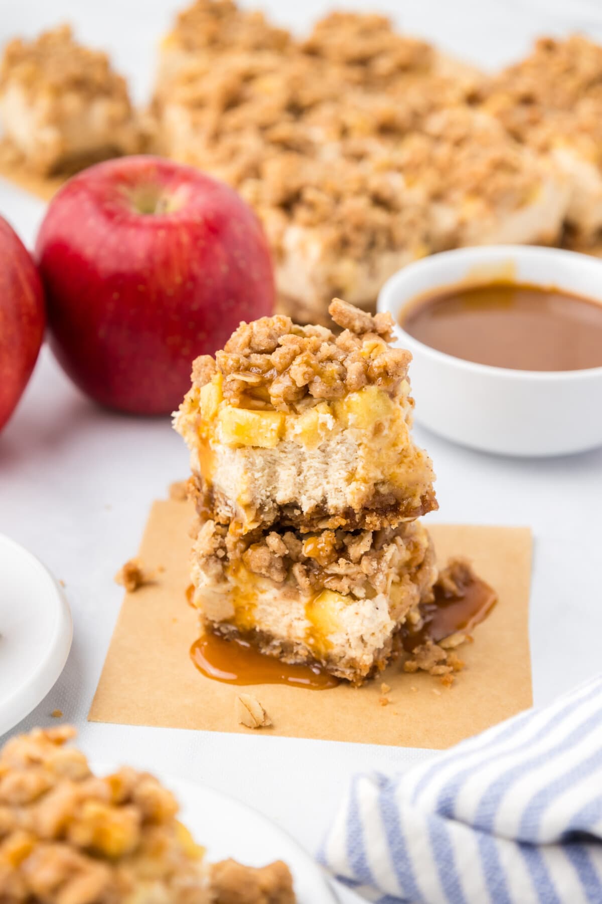 caramel apple cheesecake bars in a stack