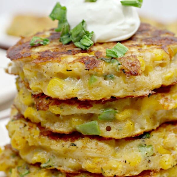 Corn Fritters stacked on a plate
