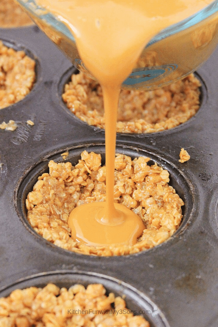Pouring peanut butter into baked oatmeal cups