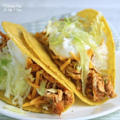 Slow cooker ranch chicken tacos with lettuce.