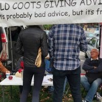 “Old Coots” Set Up Table At Farmer’s Market to Give Free Life Advice