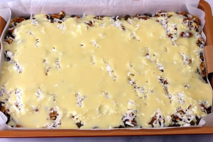 Final layer of hello dolly bars before baking