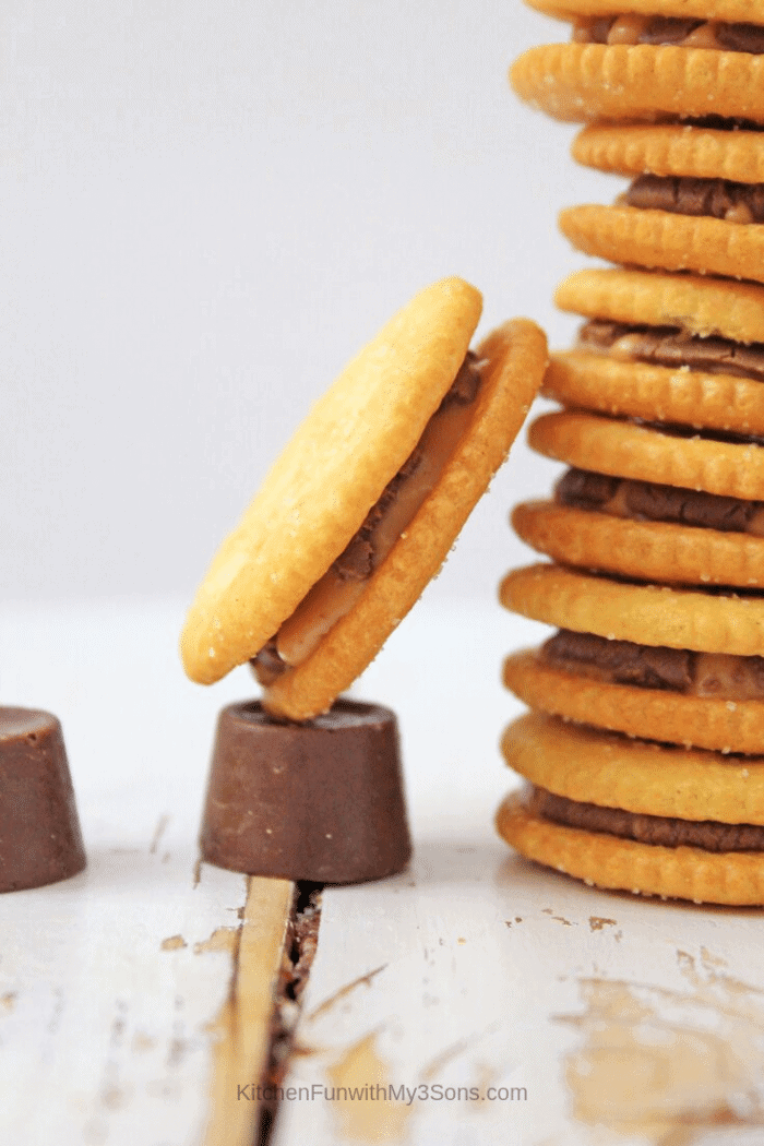 Large stack of rolo stuffed ritz crackers ready to be eaten