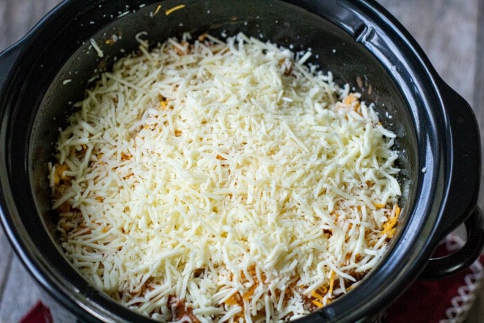 shredded cheese over casserole