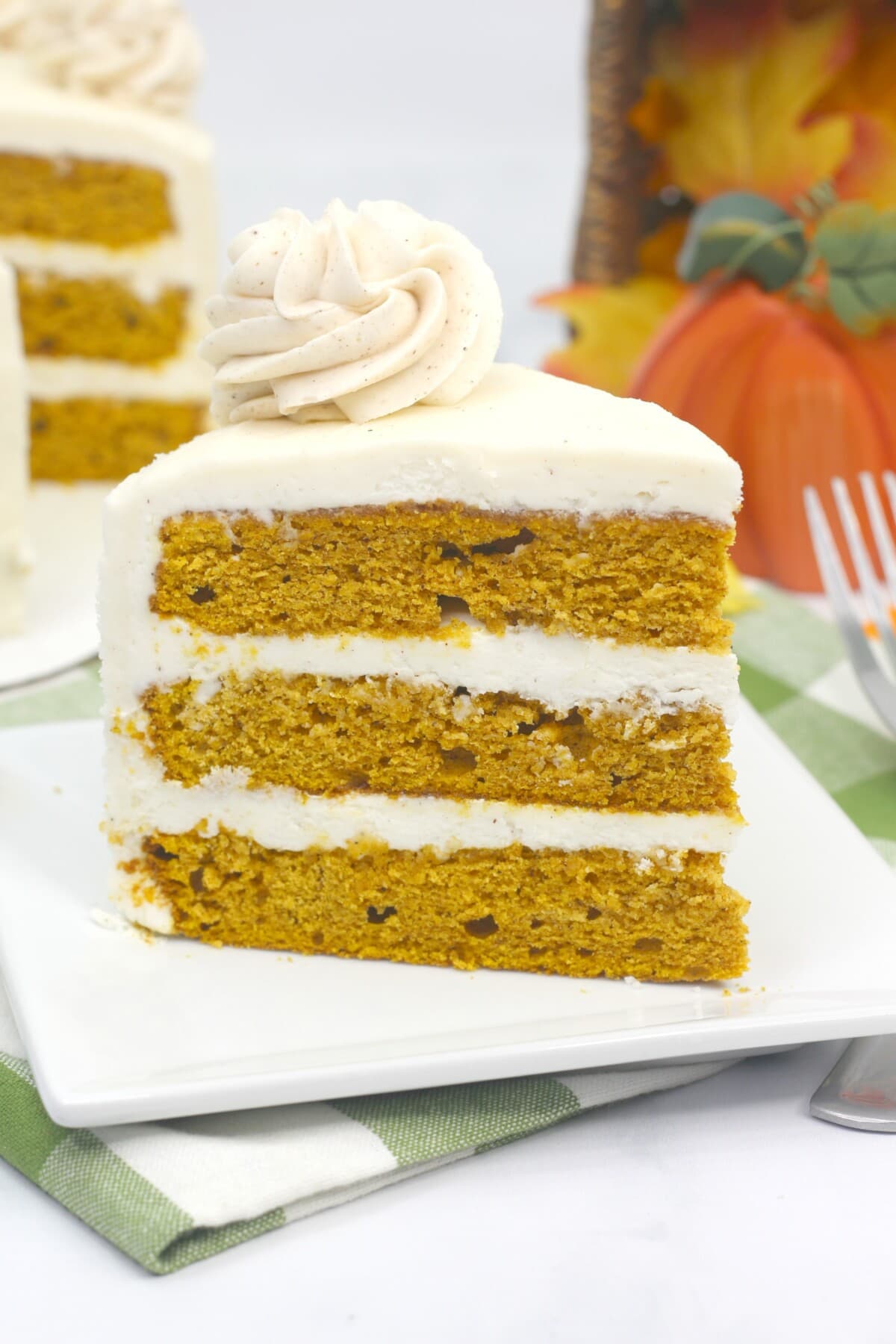 Pumpkin Layer Cake on a green table cloth.