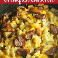 Slow cooker breakfast casserole in a large crockpot with sausage and cheese