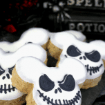 Up close picture of Jack Skellington Mickey Mouse Rice Krispie Treats on a black napkin