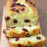 Cranberry Lemon Zucchini Bread loaf cut into slices.