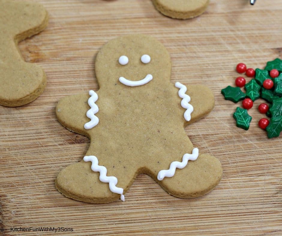 Adding the face to the gingerbread man cookies