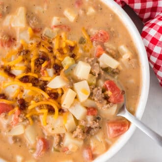 Overhead view of a bowl of cheeseburger soup