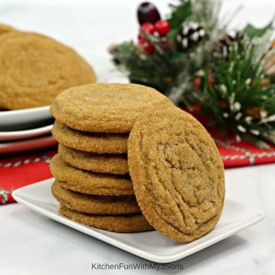 Gingerbread Molasses Cookies stacked on a small white plate