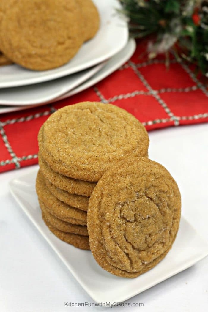 Gingerbread molasses cookies stacked on a white plate