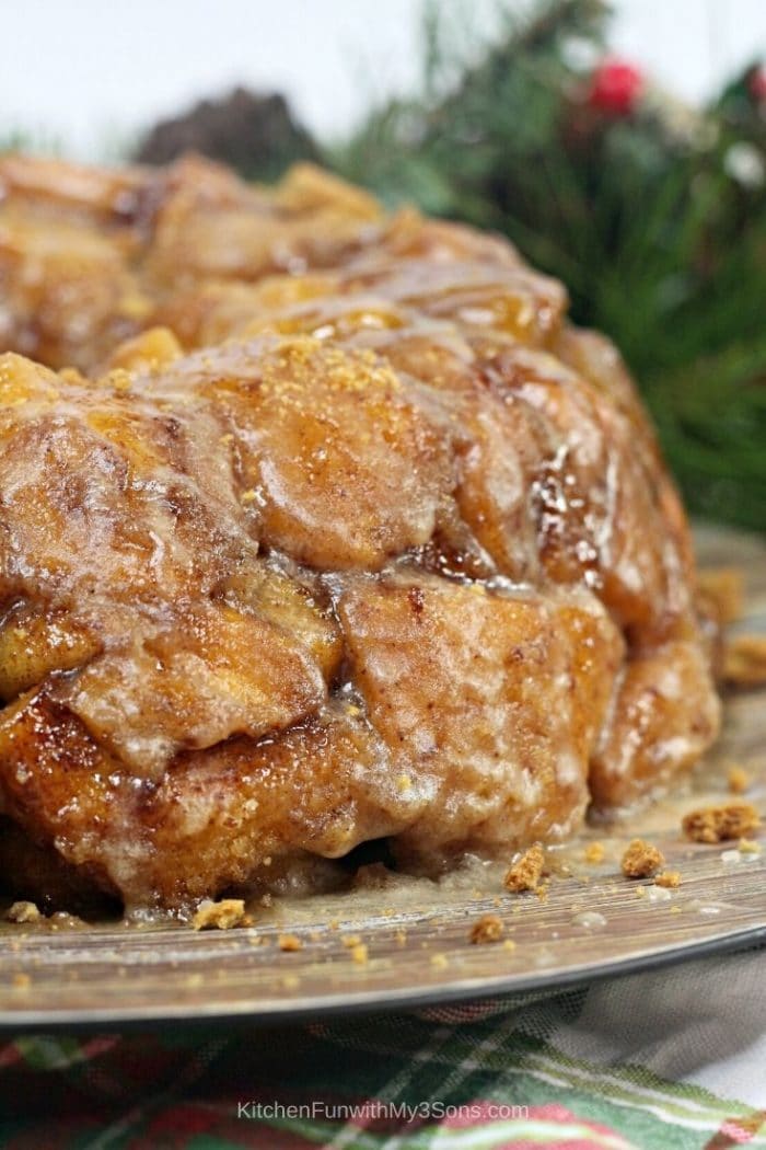Gingerbread monkey bread on a wooden tray with greenery in the background (1)