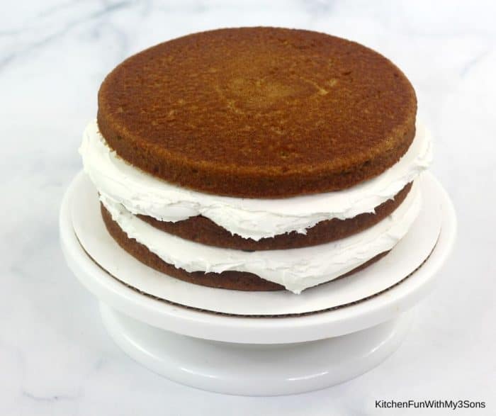 Layering gingerbread cake for gingerbread layer cake with icing between layers