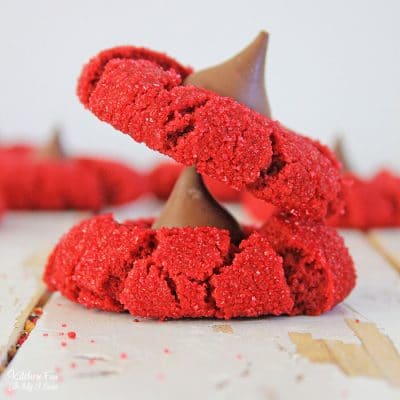 Red Velvet Peanut Butter Blossoms are the most delicious cookies! If you love red velvet cake and peanut butter, you will love this recipe.