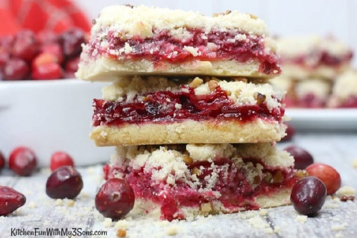 A stack of cranberry bars with crumb topping
