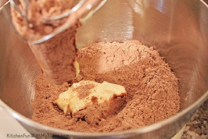 Mixing brownie batter for buckeye cookies