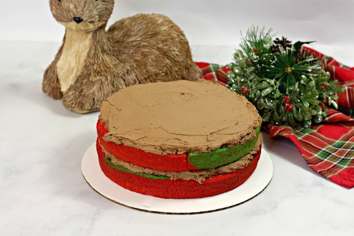A Reindeer Cake with bright red and green layers is one of the most fun and festive Christmas cakes ever!