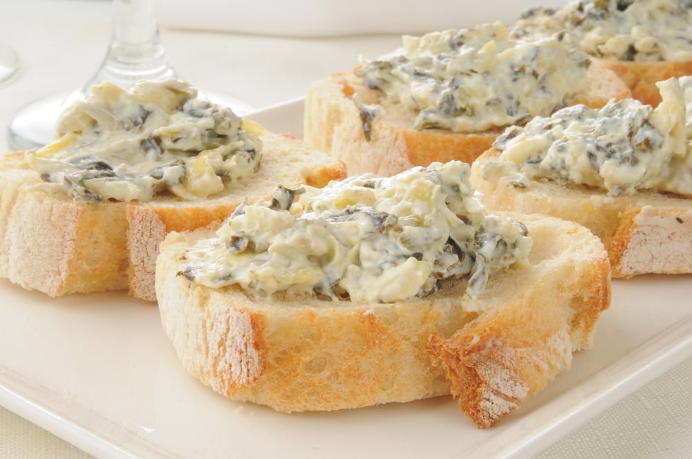 Spinach Dip on a Slice of French Bread