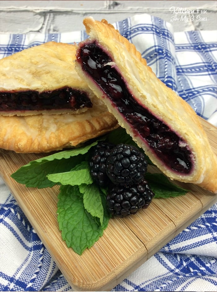 Air Fryer Blackberry Hand Pies cut in half to show off the inside