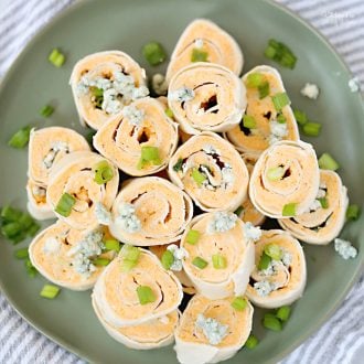 Buffalo Chicken Roll Ups with cream cheese, shredded chicken and buffalo sauce are a spicy appetizer to serve up at your next get-together.