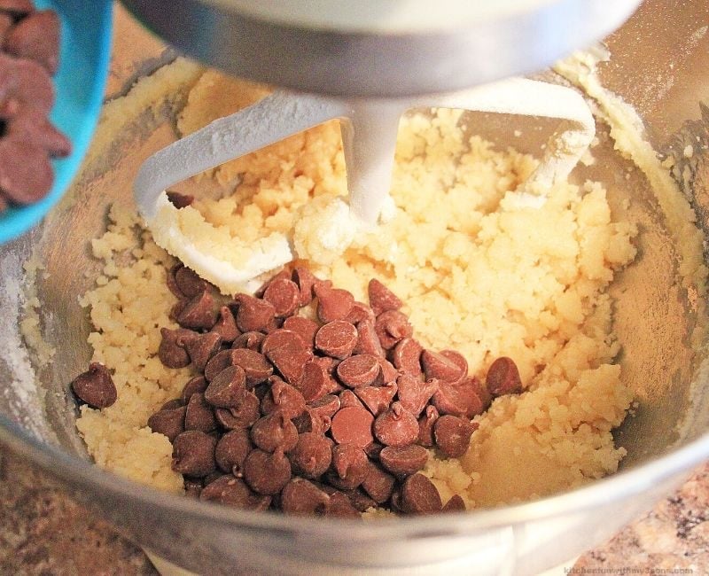 fudge batter and chocolate chips in a mixing bowl