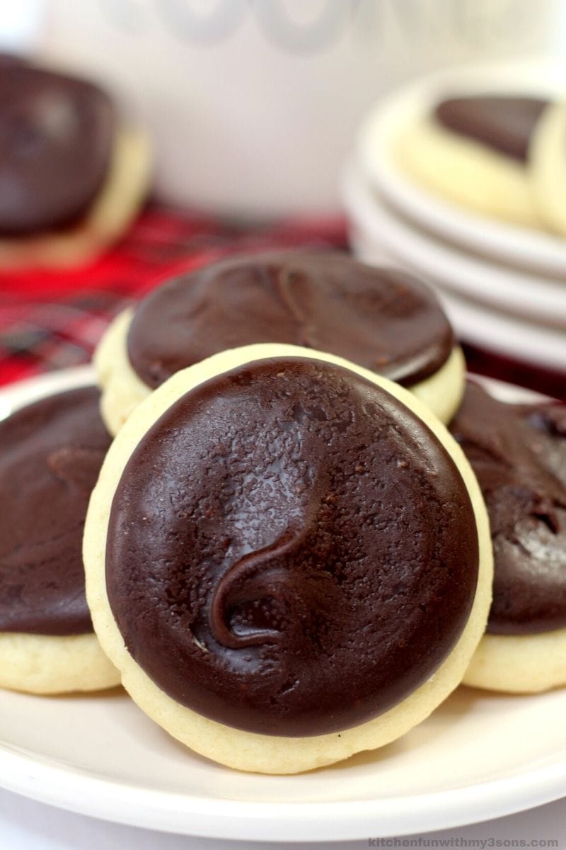 A Berger Cookie tipped to show the thick ganache on top.