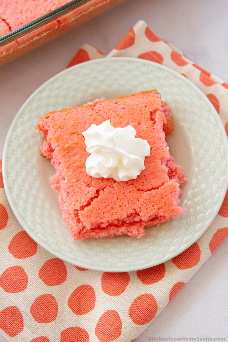 strawberry soda cake on a white plate