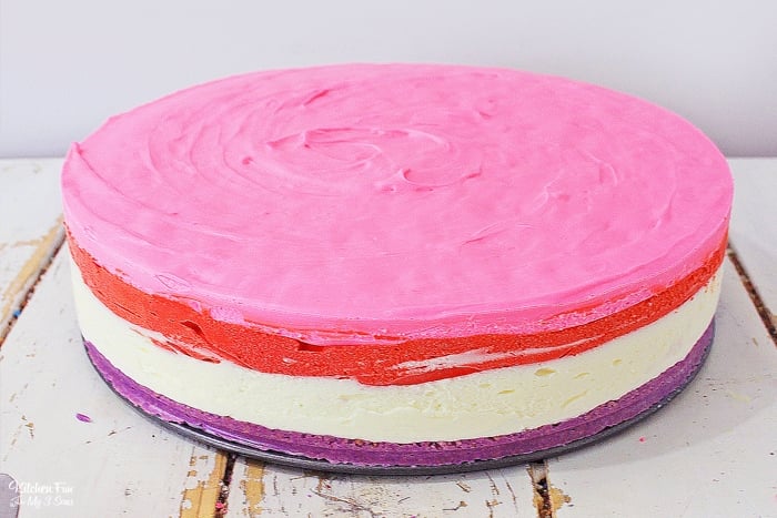 Valentines Cheesecake is a triple layer dessert with a cookie crust. It's easy to make, it's no-bake, and it's frozen, so you can make it ahead and serve it when you're ready.