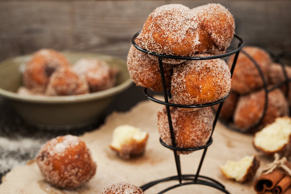 Air Fryer Donut Holes in a metal stand