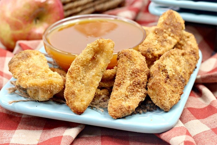 Air Fryer Apple Fries on a white plate with caramel dipping sauce