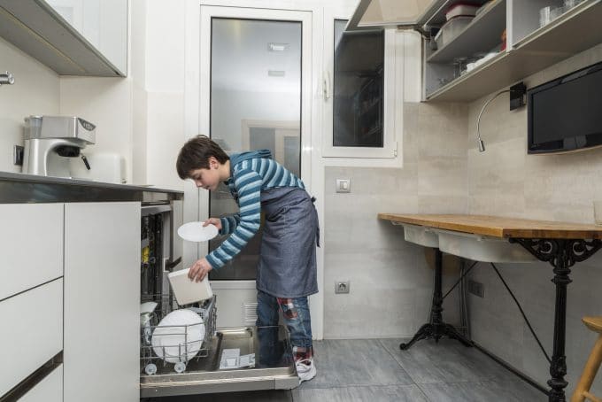 Boy Washing Dishes