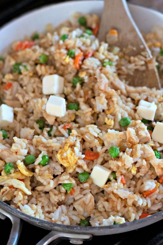 chicken fried rice together in a pan