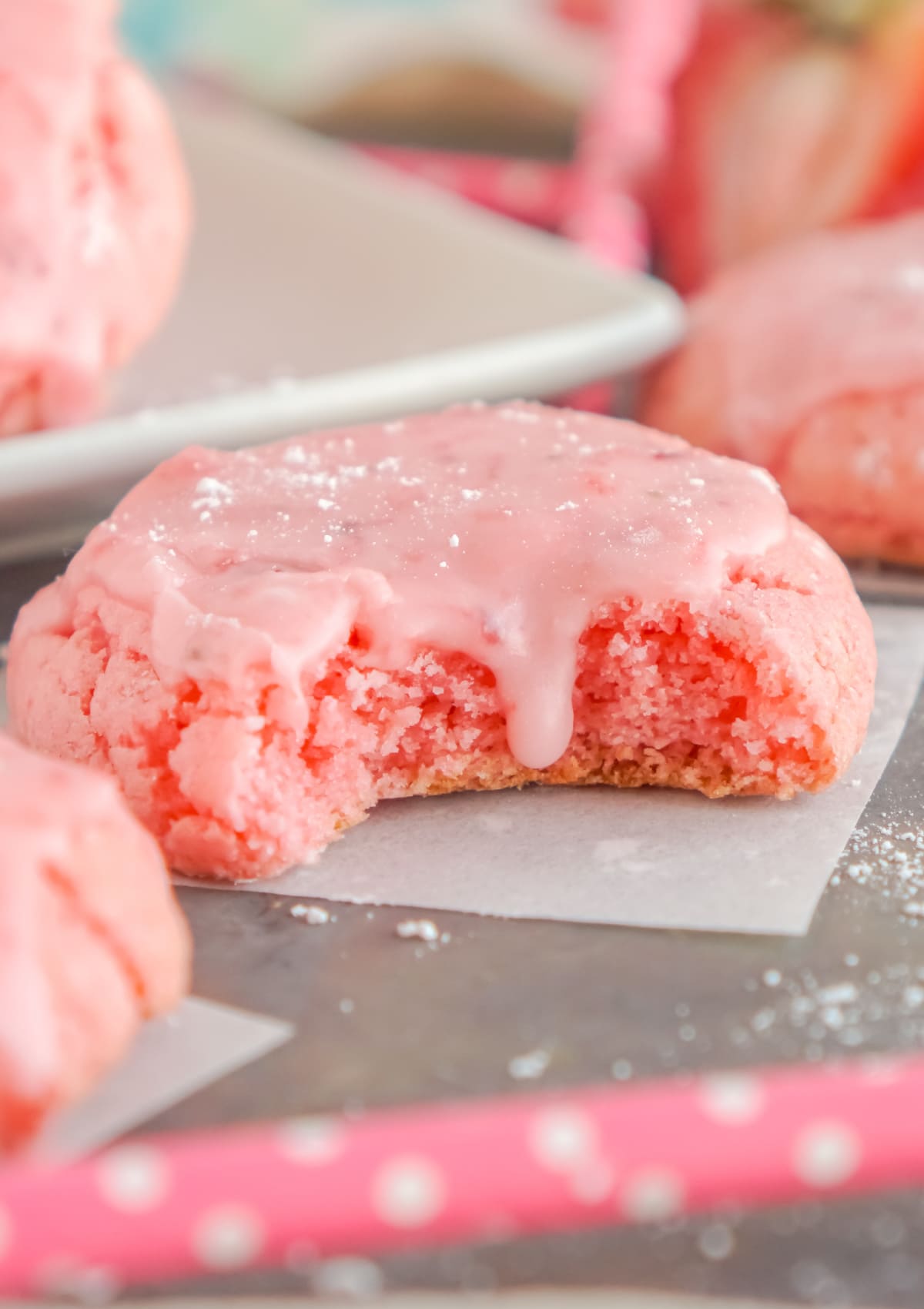 Strawberry Cake Mix Cookies with a bite taken out