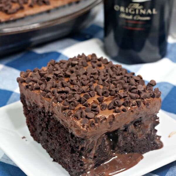 Bailey's Irish Cream Poke Cake on a white plate