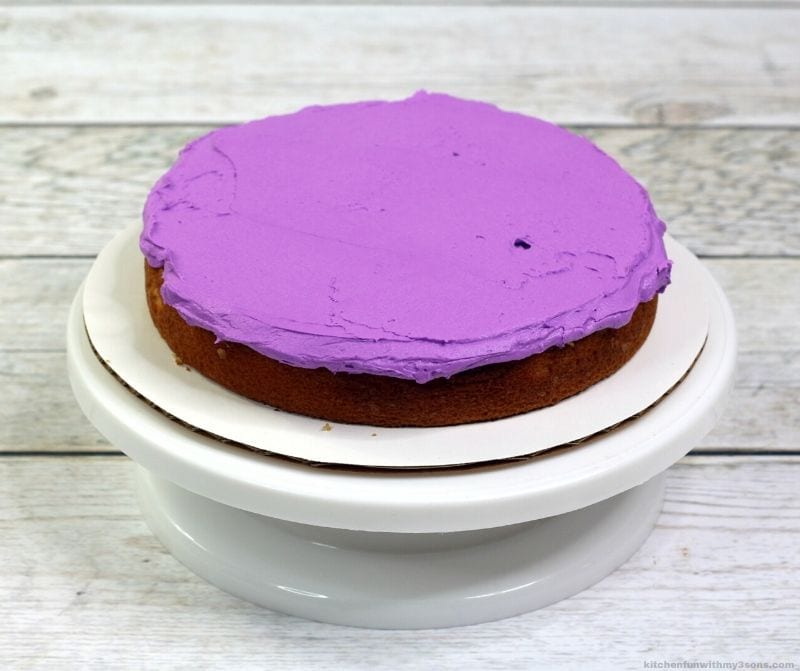 cake layer with purple frosting