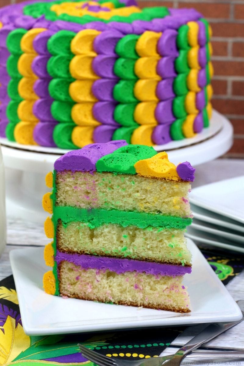 Best Ever Mardi Gras Cake on a white plate
