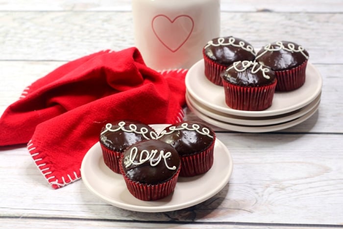 Homemade Hostess Cupcakes for Valentine's Day are a delicious treat for the holiday. These are so much like the original: chocolate cupcakes filled with yummy cream and topped with chocolate.