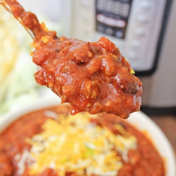 Instant Pot Three Bean Chili on a spoon
